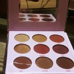 Okalàn 9 color pressed powder pallette